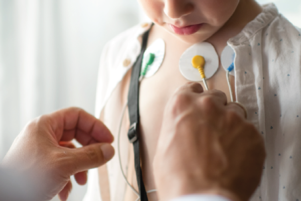 a pediatric patient is examined by a physician